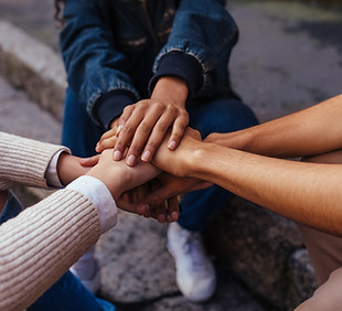 Hands Showing Unity