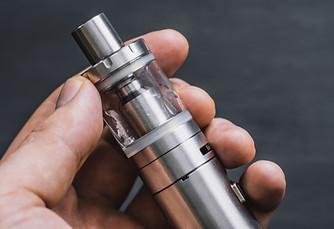 Holding E-cigarette