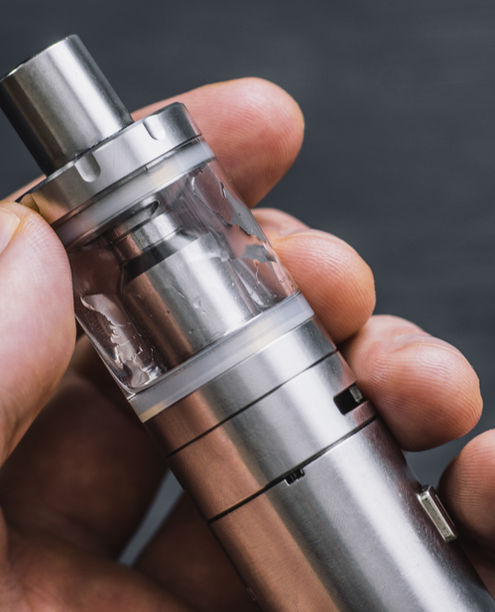 Holding E-cigarette
