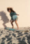 Girl Posing on Surfboard