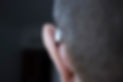 An ear digital audio phone hearing aid in the ear of man