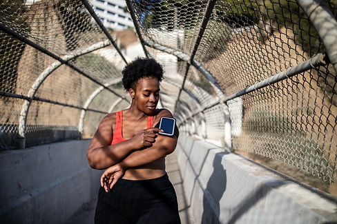 Woman using fitness tracker