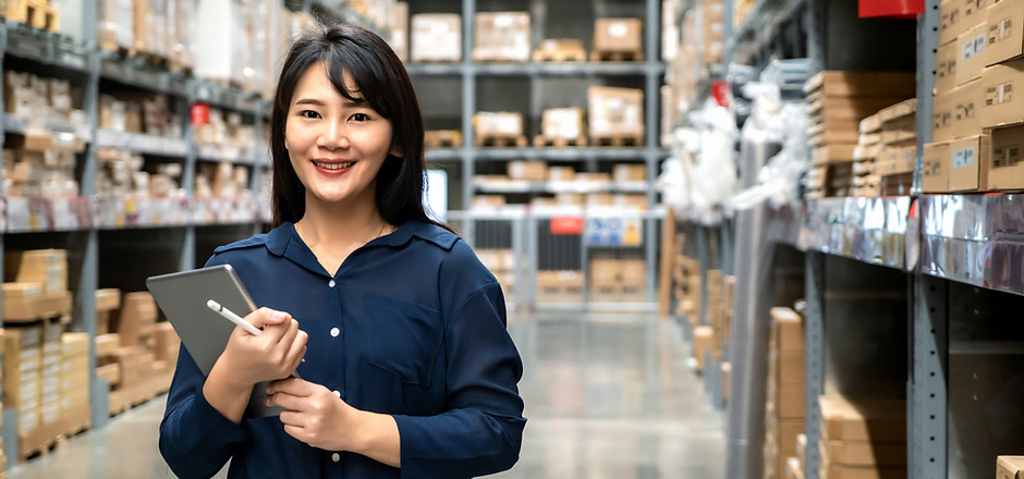 A female staff in a warehouse