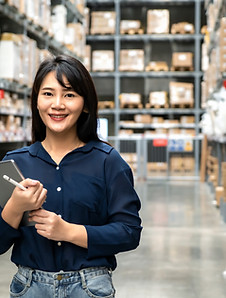 A female staff in a warehouse