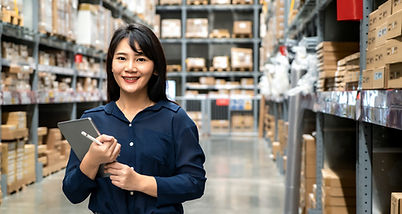 A female staff in a warehouse