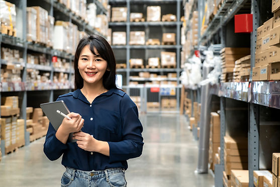 A female staff in a warehouse