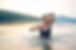 An Older Woman Bathing in. the Sea