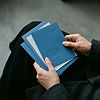 Blue Stationery Held