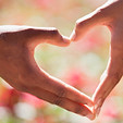hand cupped to form a heart shape