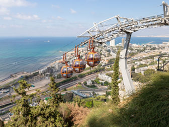 חוויה נהדרת של עלייה ברכבלית של חיפה מול נוף הים לפני סדנא מגבשת בצפון