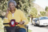 woman using mobile phone on electric scooter
