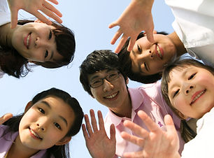 Smiling Students and Teacher