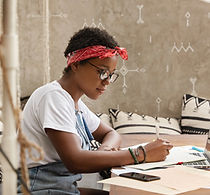 A Young Woman Writing