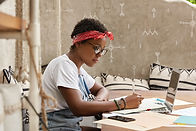 A Young Woman Writing