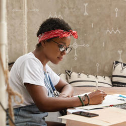 A Young Woman Writing