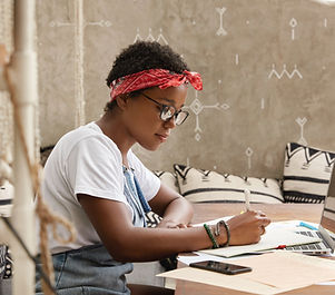 A Young Woman Writing