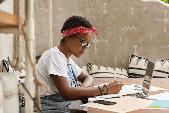 A Young Woman Writing
