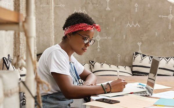A Young Woman Writing