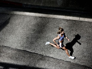 Woman running on the road