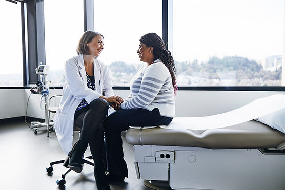 Actor portrayal image featuring a medical professional sharing space with a patient.