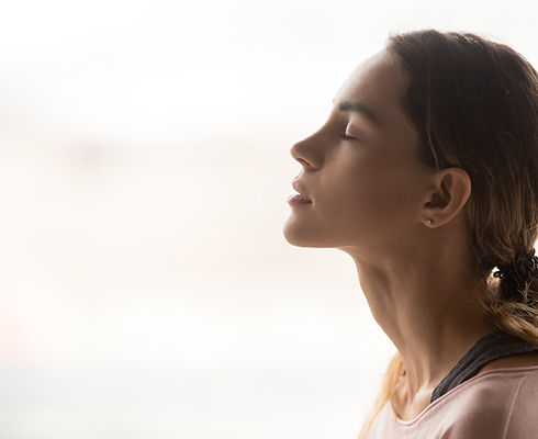 Woman Meditating Calmly