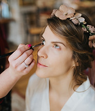 Putting concealer on