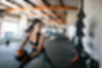 Woman using medicine ball