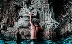 Man Climbing Wall