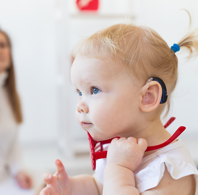 Baby with Hearing Aid