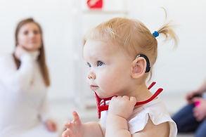 Baby with Hearing Aid