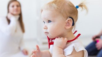 Baby with Hearing Aid