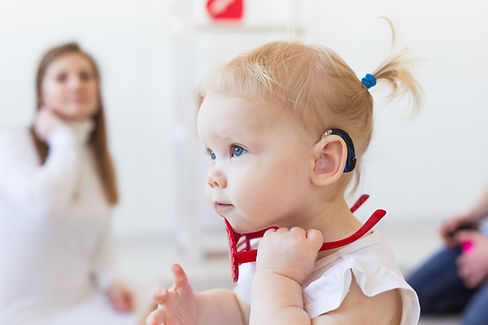 Baby with Hearing Aid