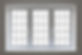 a modern UPVC double glazed window unit set into a recess with a window sill. This is an e