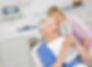 Dental assistant working on patient