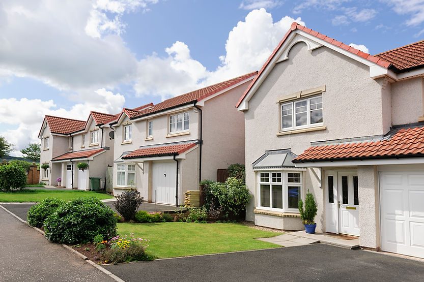 A row of detached properties on a housing estate in the UK