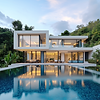 Villa with pool at dusk