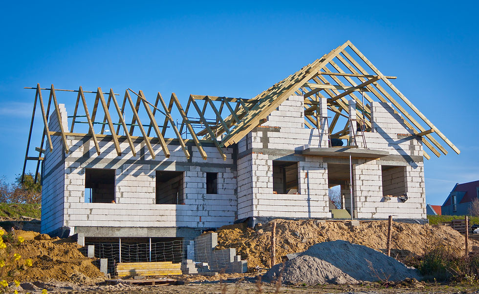 New building under construction against a blue sky