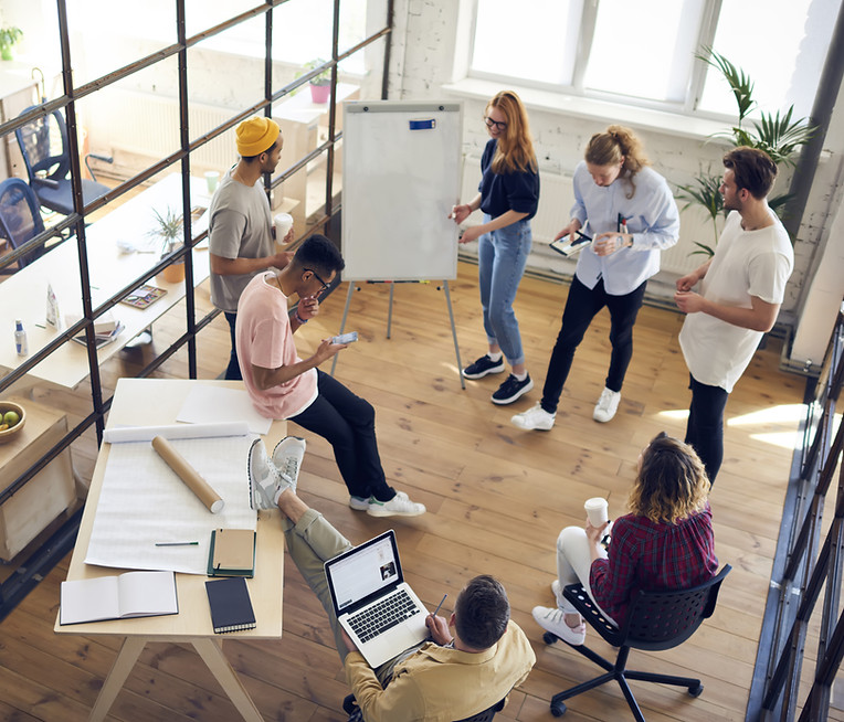 team meeting in open-concept office