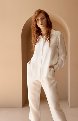Woman in White Suit