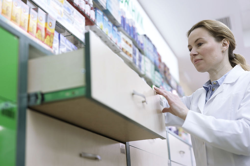 Pharmacist Organizing Inventory
