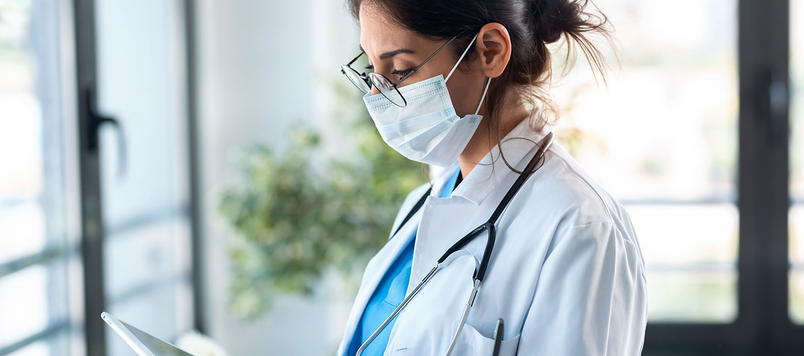 Doctor Using Tablet
