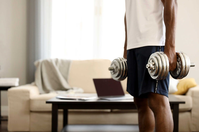 Man lifting dumbbells