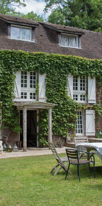 Property with ivy growing on walls