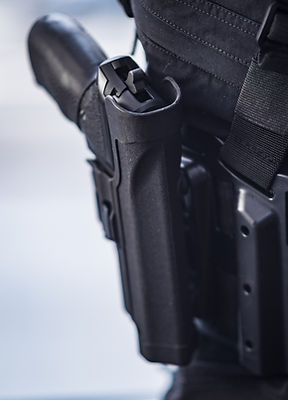 Weapon In Holster