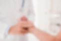 Doctor taking patients pulse