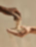 Hands Holding Sand