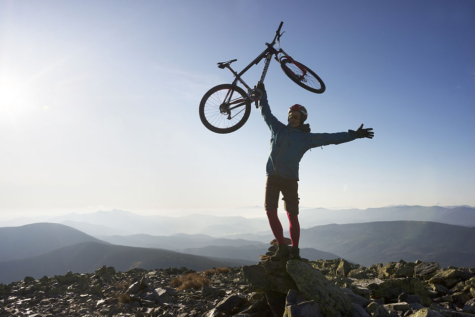 Biker on Mountain Top