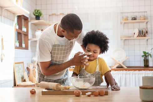Father and child baking