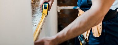 Handyman with Measuring Tape