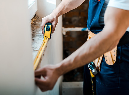 Handyman with Measuring Tape